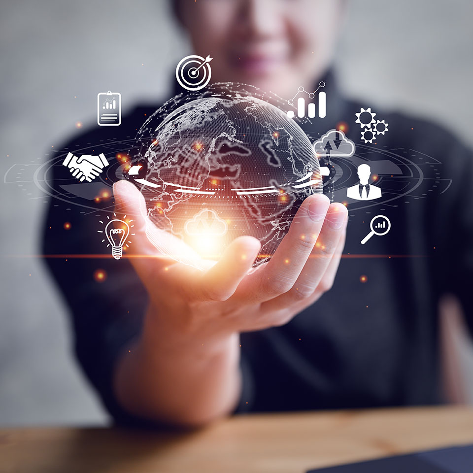 Man holding a globe surrounded by icons representing offerings